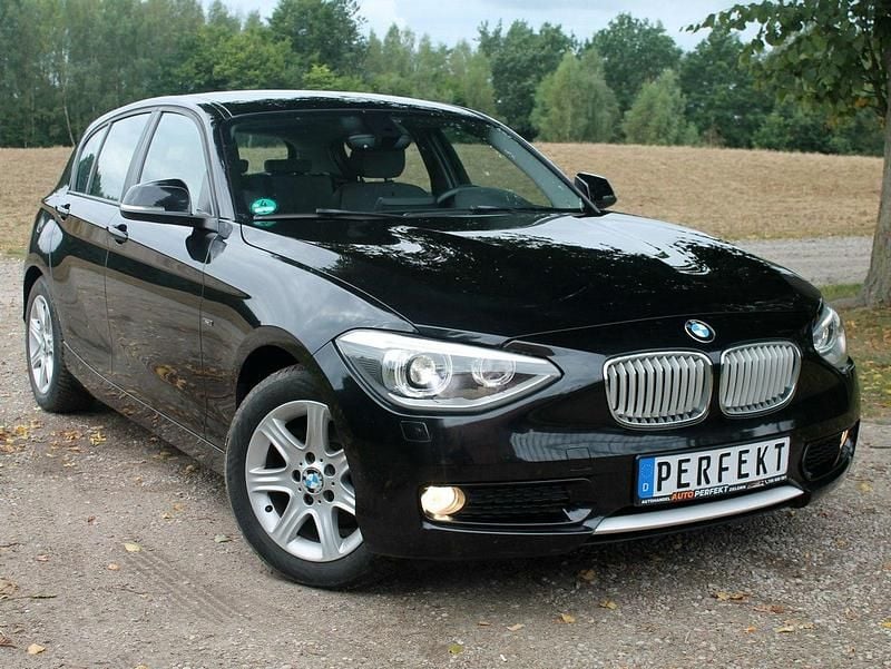 Czarny Używany 2011 BMW 116 Comfort Edition Hatchback | 29 999 zł (Uczciwa cena) - Obraz 1/4