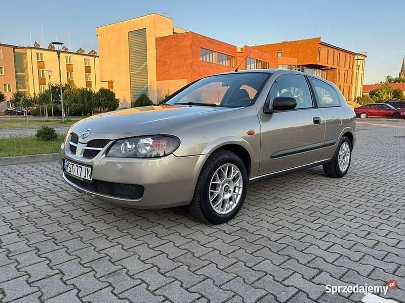 Używany Nissan Almera 2003 Złoty Hatchback