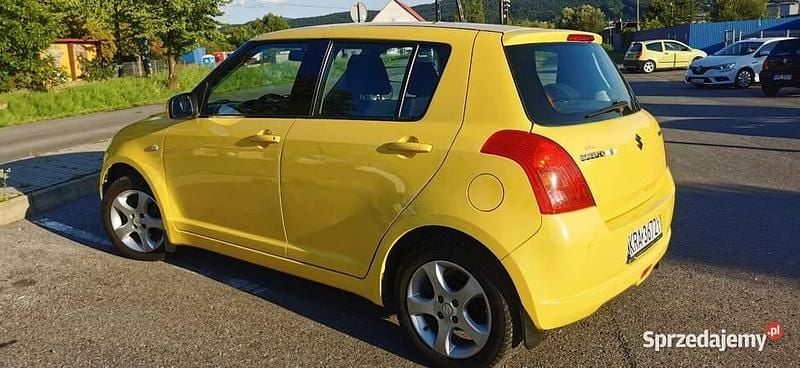 Żółty Używany 2005 Suzuki Swift Hatchback | 11 500 zł (Uczciwa cena) - Obraz 1/4