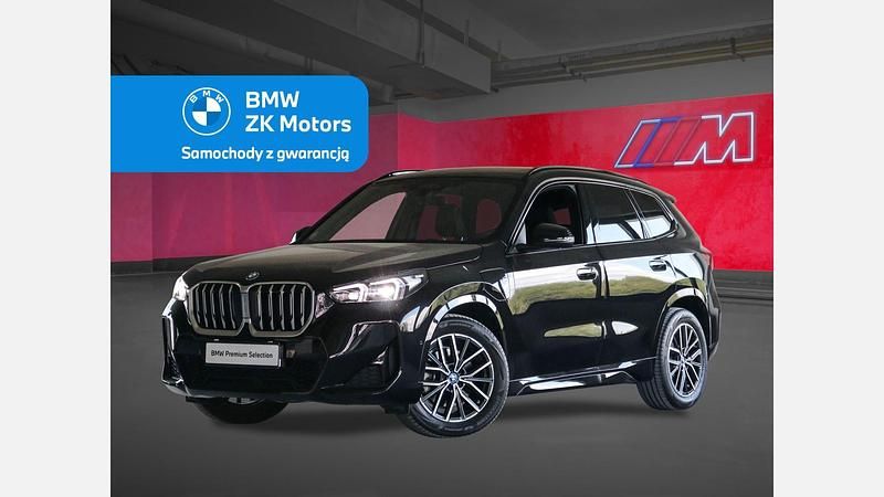 Czarny szafir metalizowany Używany 2024 BMW X1 Luxury Line SUV | 229 900 zł - Obraz 1/3