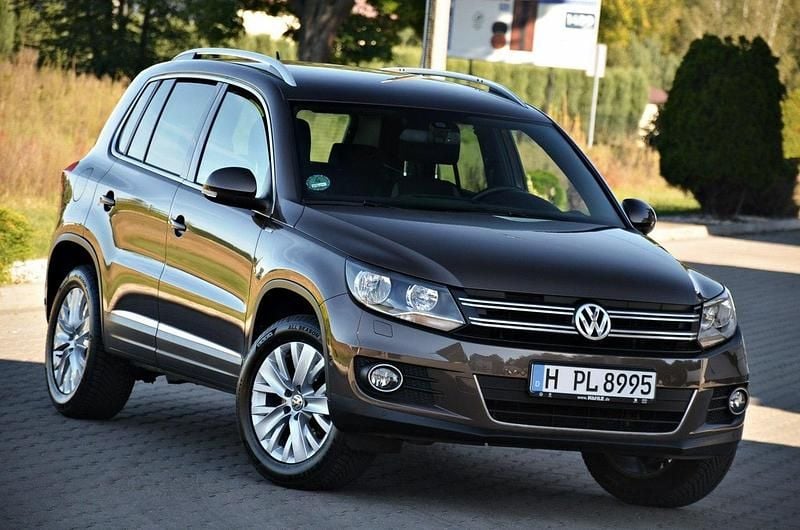Brązowy (metalik, perła) Używany 2013 VW Tiguan SUV | 39 900 zł - Obraz 1/4