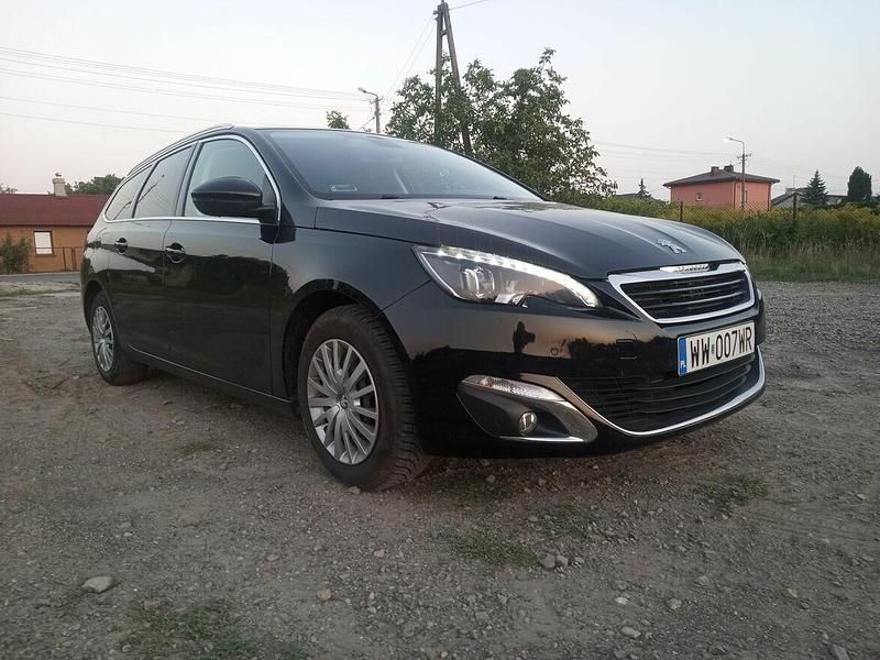 Używany Peugeot 308 SW 2014 Czarny Kombi