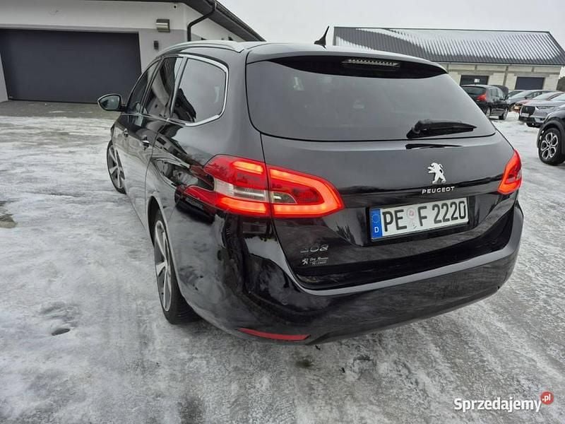 Używany Peugeot 308 120 KM (88 kW) 2014 Czarny Sedan/Limuzyna