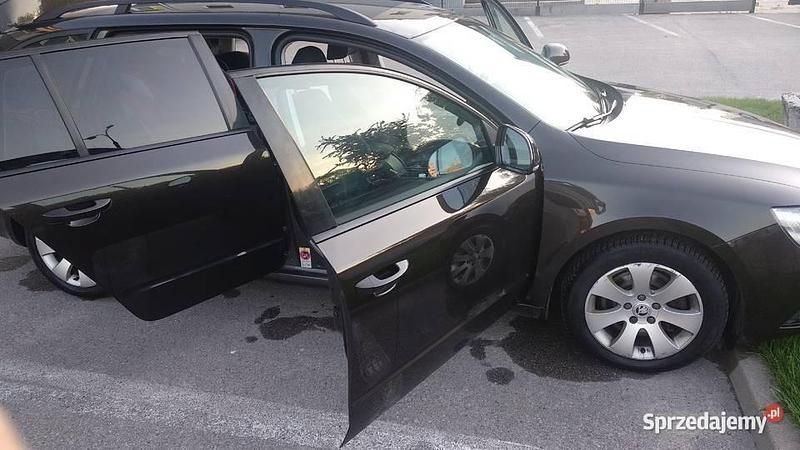 Używany Skoda Superb 170 KM (125 kW) 2014 Brązowy Kombi