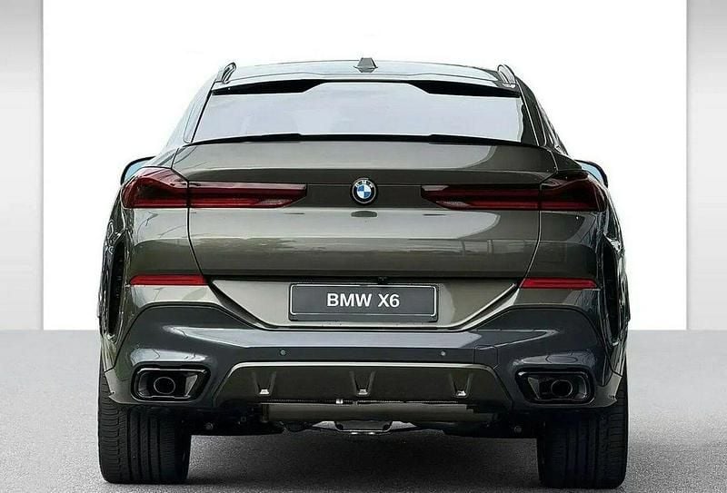 Używany BMW X6 Comfort Edition 265 KM (194 kW) 2024 Brązowobeżowy SUV