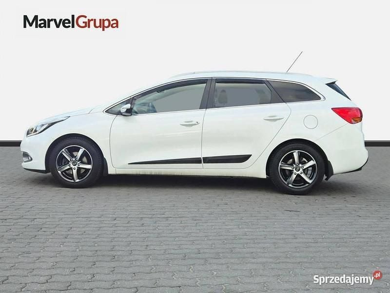 Biały (metalik) Używany 2014 Kia Ceed 2 Kombi | 38 900 zł (Uczciwa cena) - Obraz 1/4