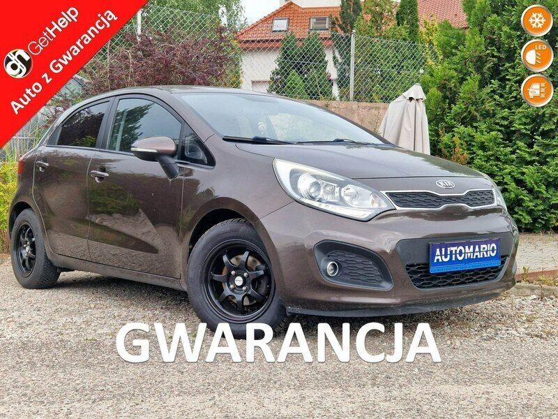 Brązowy Używany 2012 Kia Rio 2 Hatchback | 22 900 zł (Drogi) - Obraz 1/4