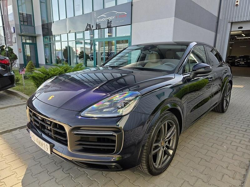 Niebieski ciemny (metalik) Używany 2021 Porsche Cayenne Sport SUV | 365 000 zł (Uczciwa cena) - Obraz 1/4