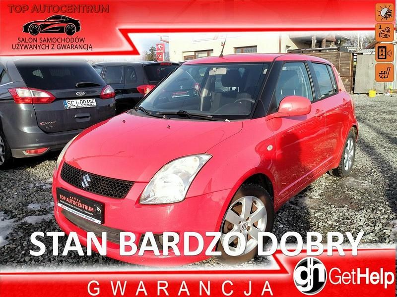 Czerwony (metalik) Używany 2009 Suzuki Swift Hatchback | 12 900 zł (Uczciwa cena) - Obraz 1/4
