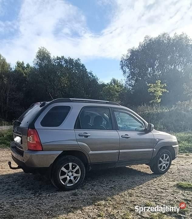 Złoty Używany 2010 Kia Sportage SUV | 24 000 zł (Uczciwa cena) - Obraz 1/4