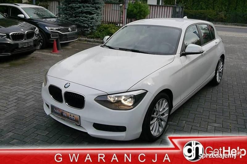 Biały Używany 2014 BMW 116 Hatchback | 36 800 zł (Uczciwa cena) - Obraz 1/4