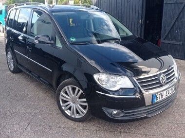 Czarny Używany 2009 VW Touran Minivan | 21 900 zł (Uczciwa cena) - Obraz 1/4