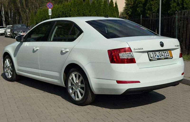Używany Skoda Octavia Sport 105 KM (77 kW) 2014 Biały Sedan/Limuzyna