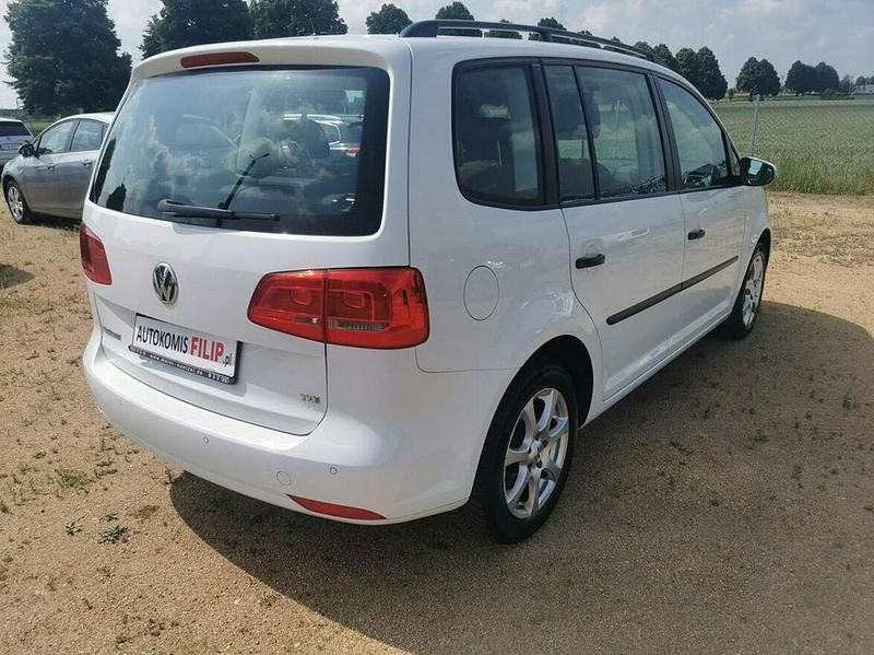 Używany VW Touran 105 KM (77 kW) 2014 Biały Minivan