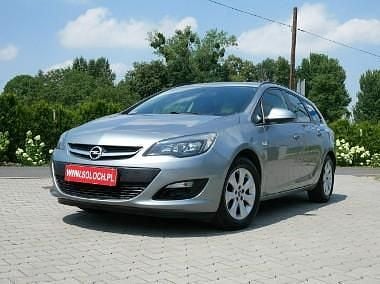 Szary Używany 2014 Opel Astra Enjoy Kombi | 28 900 zł (Uczciwa cena) - Obraz 1/4