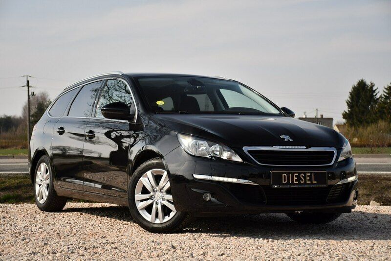 Używany Peugeot 308 120 KM (88 kW) 2014 Niebieski ciemny (metalik, perła) Hatchback