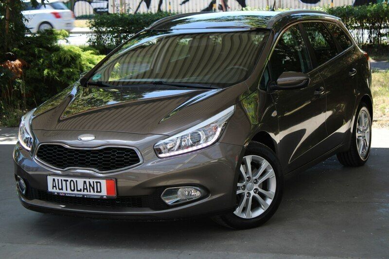 Brązowy Używany 2014 Kia Ceed 2 Kombi | 39 555 zł - Obraz 1/4