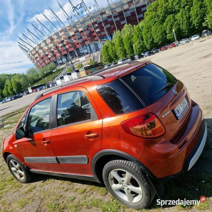 Pomarańczowy Używany 2009 Suzuki SX4 Hatchback | 17 500 zł (Uczciwa cena) - Obraz 1/4