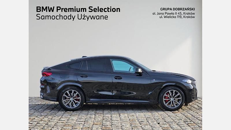 Używany BMW X6 Comfort Edition 340 KM (250 kW) 2024 Czarny szafir metalizowany SUV