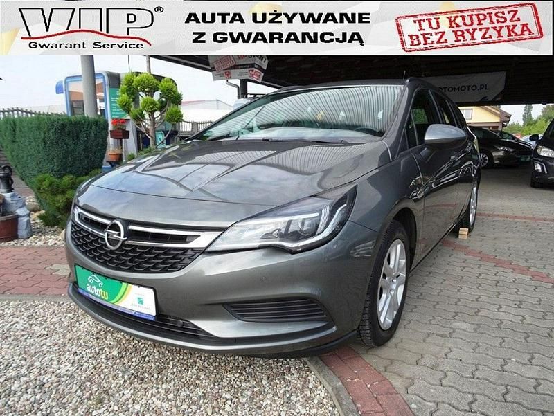 Używany Opel Astra Enjoy 110 KM (80 kW) 2017 Beżowy Sedan/Limuzyna