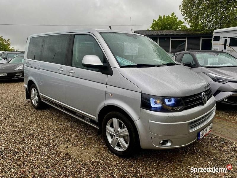 Srebrny Używany 2013 VW Multivan R Minivan | 99 400 zł (Uczciwa cena) - Obraz 1/4