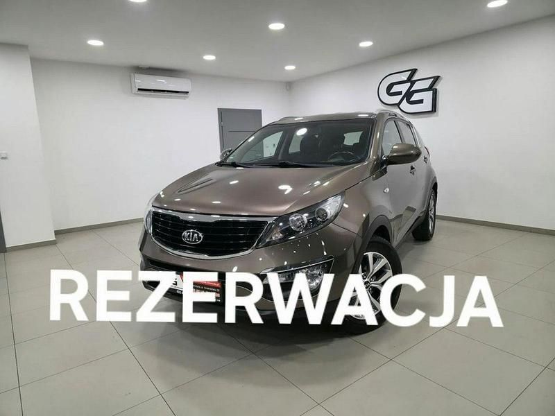 Brązowy Używany 2015 Kia Sportage 2 SUV | 53 999 zł (Uczciwa cena) - Obraz 1/4