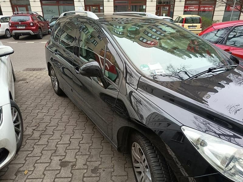 Używany Peugeot 308 SW 2010 Czerwony Kombi