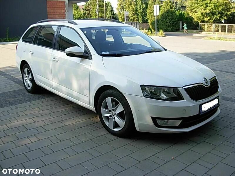 Biały Używany 2014 Skoda Octavia Ambition Kombi | 28 900 zł - Obraz 1/4