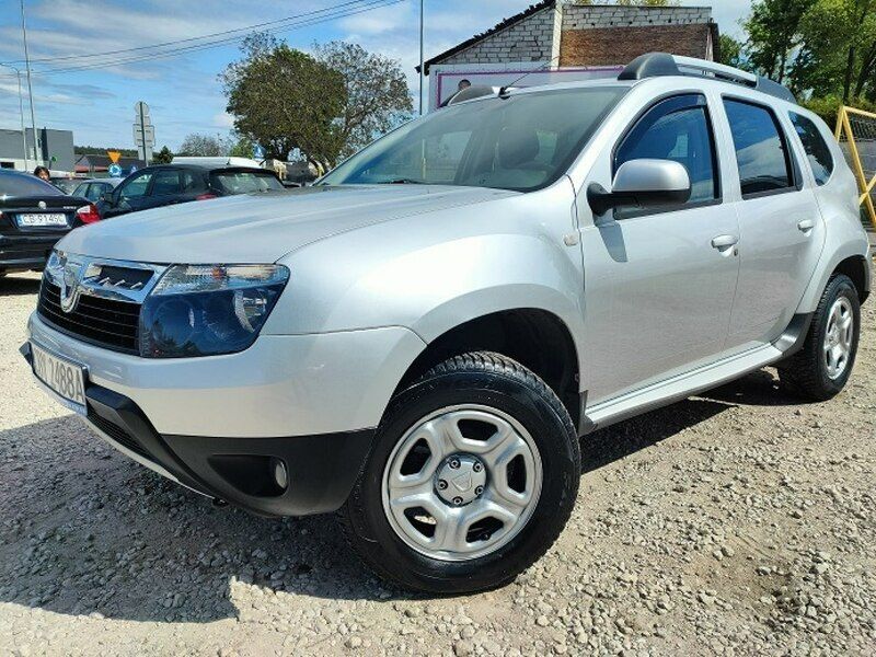 Srebrny (metalik) Używany 2011 Dacia Duster SUV | 24 990 zł (Uczciwa cena) - Obraz 1/4