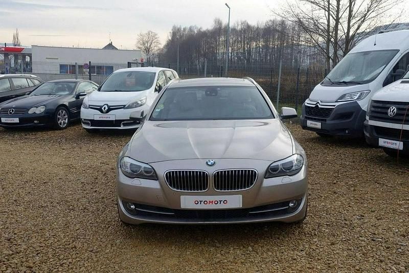 Używany BMW M550 258 KM (189 kW) 2011 Beżowy (metalik) Sedan/Limuzyna