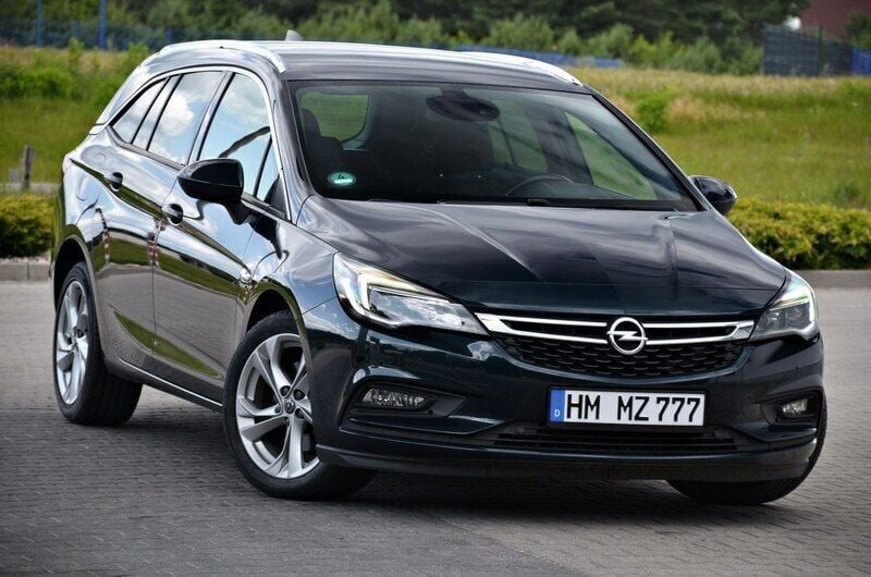 Zielony ciemny (metalik, perła) Używany 2016 Opel Astra Kombi | 33 900 zł (Uczciwa cena) - Obraz 1/4