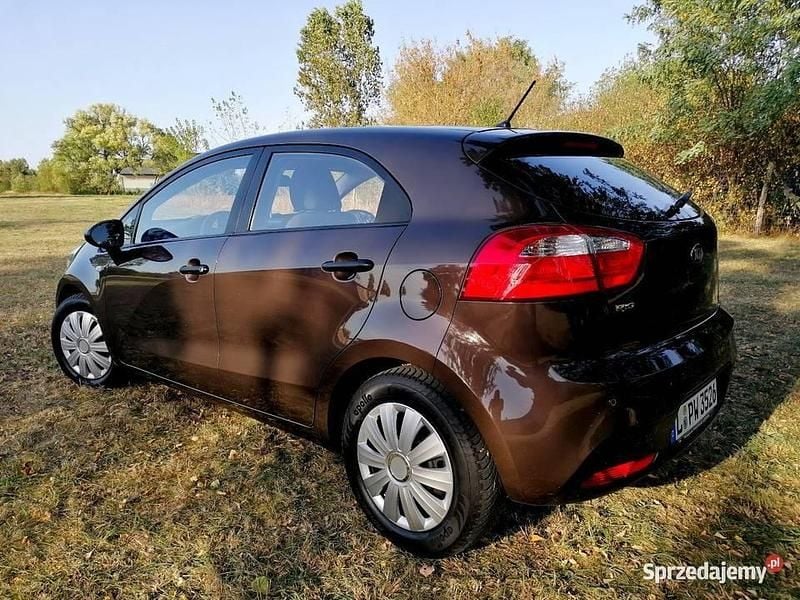 Brązowy Używany 2013 Kia Rio Hatchback | 26 700 zł (Uczciwa cena) - Obraz 1/4