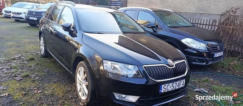 Czarny Używany 2015 Skoda Octavia Kombi | 25 900 zł (Super Cena) - Obraz 1/4