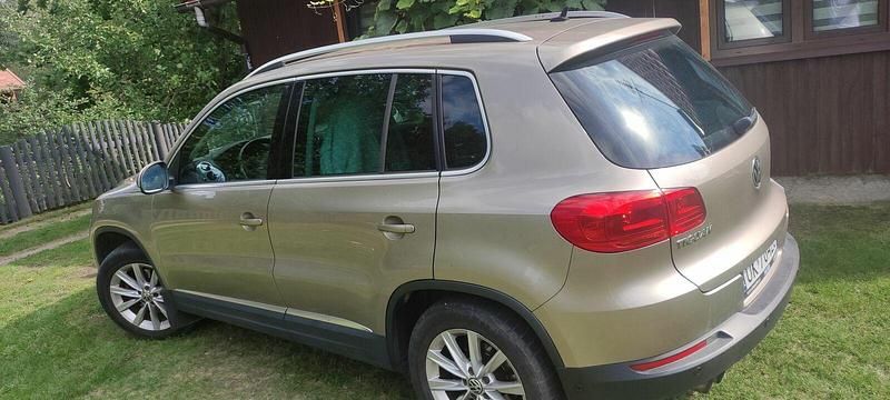 Żółtozłoty Używany 2011 VW Tiguan SUV | 42 000 zł (Uczciwa cena) - Obraz 1/4