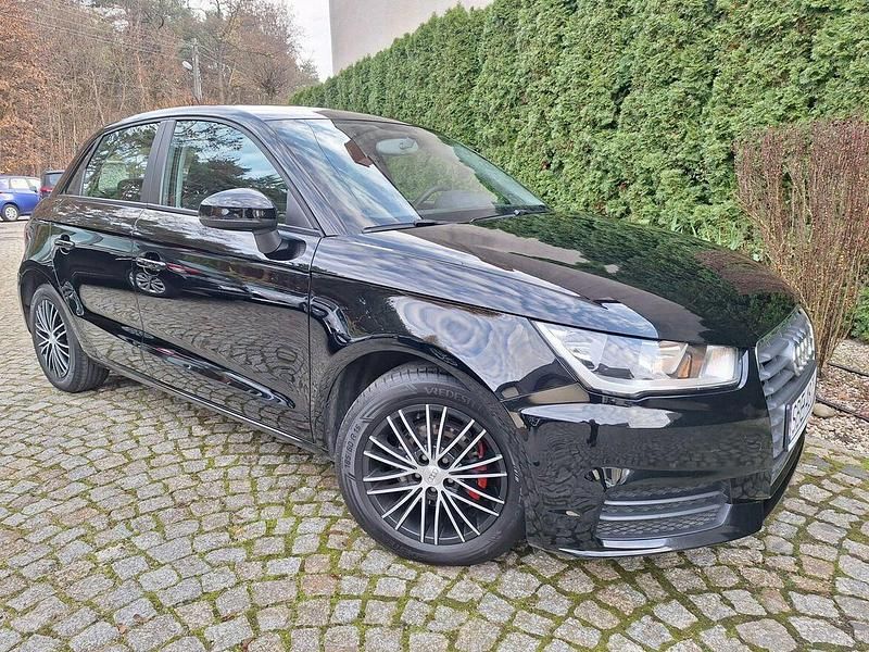 Czarny Używany 2016 Audi A1 Sportback Comfort Hatchback | 29 600 zł - Obraz 1/4