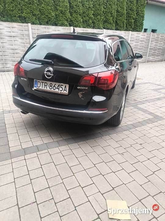 Czarny Używany 2014 Opel Astra Kombi | 26 500 zł (Uczciwa cena) - Obraz 1/4