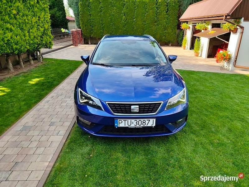 Niebieski Używany 2018 Seat Leon Kombi | 47 900 zł (Uczciwa cena) - Obraz 1/4