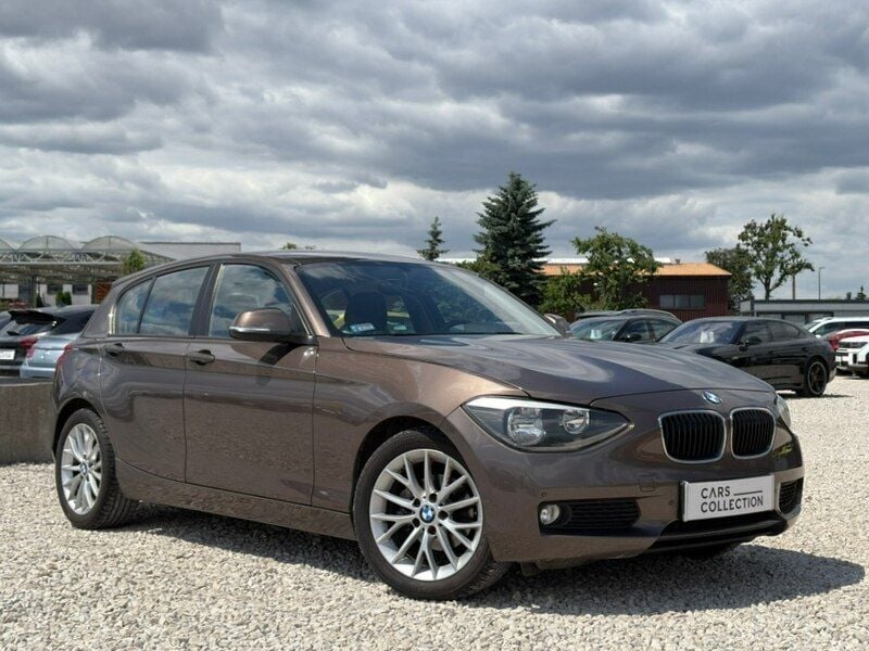 Brązowy (metalik) Używany 2012 BMW 116 Hatchback | 39 900 zł (Uczciwa cena) - Obraz 1/4