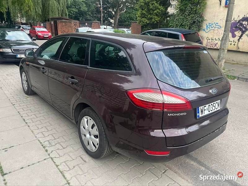 Używany Ford Mondeo 125 KM (91 kW) 2010 Wiśniowy Kombi