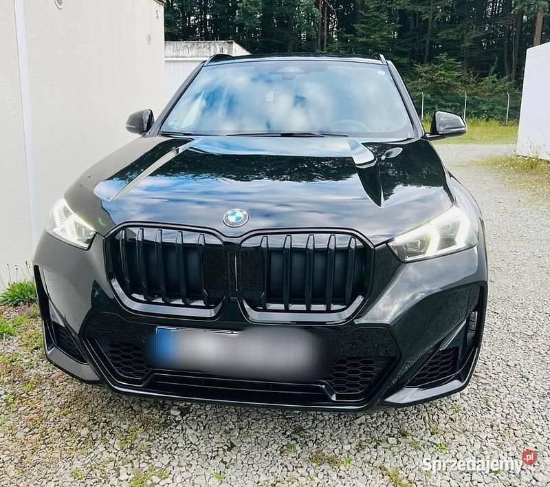 Czarny Używany 2022 BMW X1 M Sport SUV | 145 900 zł - Obraz 1/4