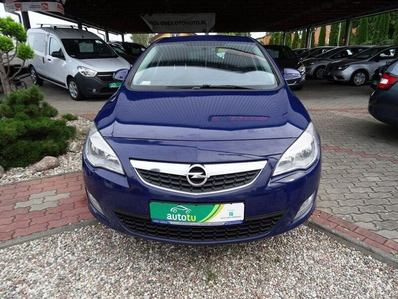 Używany Opel Astra Enjoy 125 KM (91 kW) 2012 Granatowy Hatchback