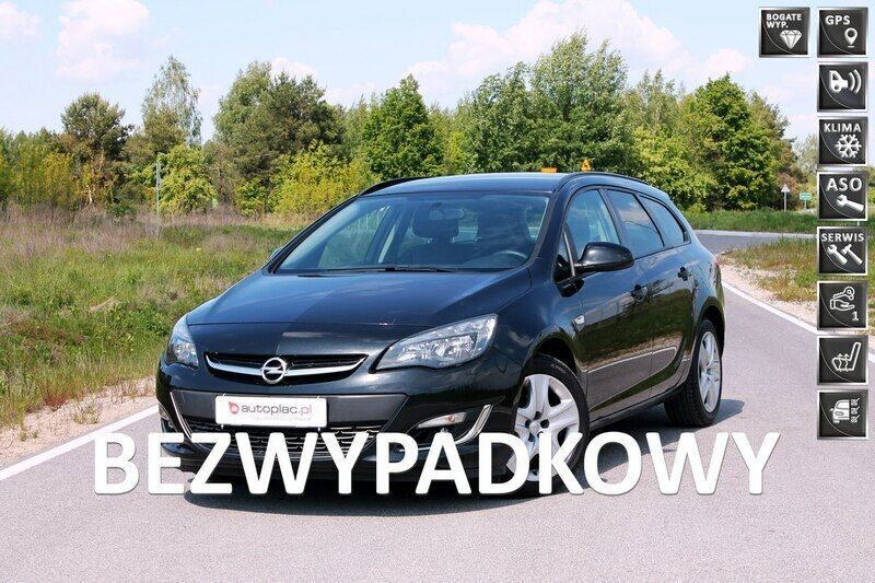 Czarny (metalik) Używany 2013 Opel Astra Hatchback | 24 999 zł (Uczciwa cena) - Obraz 1/4