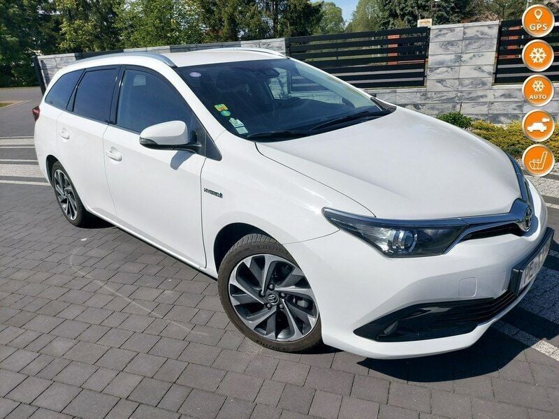 Biały Używany 2018 Toyota Auris Hybrid Hatchback | 61 400 zł (Uczciwa cena) - Obraz 1/4