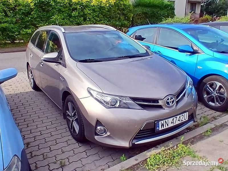 Beżowy Używany 2014 Toyota Auris Hybrid Kombi | 49 000 zł (Uczciwa cena) - Obraz 1/4