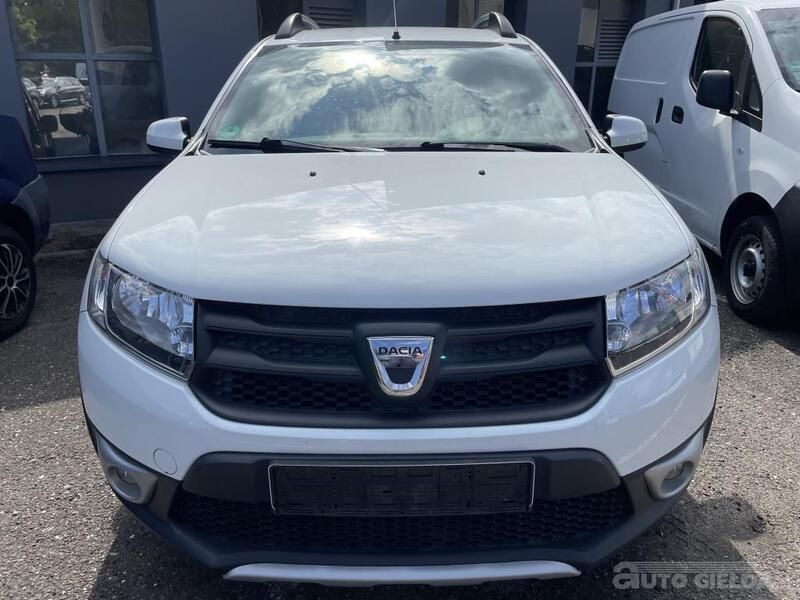 Biały Używany 2014 Dacia Sandero Hatchback | 23 900 zł (Uczciwa cena) - Obraz 1/4