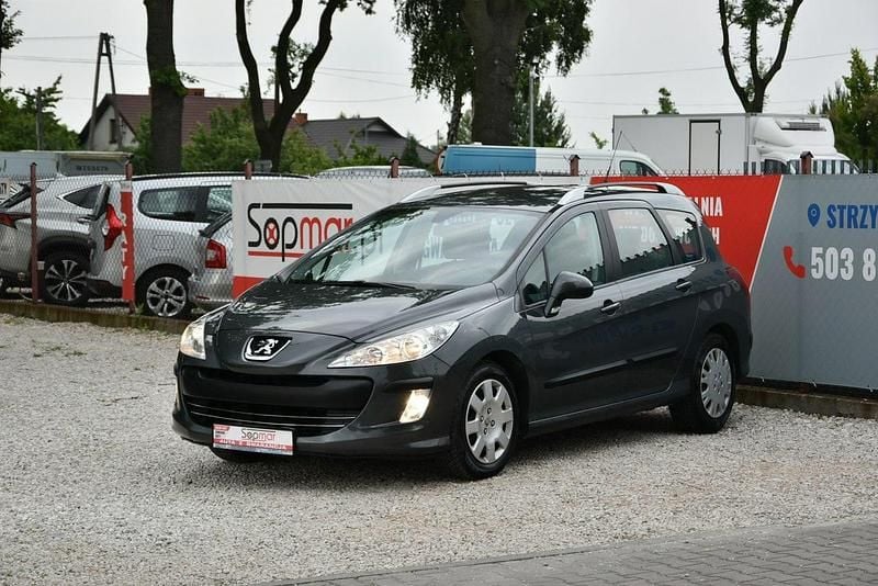 Używany Peugeot 308 SW 90 KM (66 kW) 2010 Szary (metalik, perła) Kombi