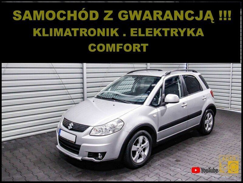 Srebrny (metalik) Używany 2009 Suzuki SX4 SUV | 21 888 zł (Uczciwa cena) - Obraz 1/4