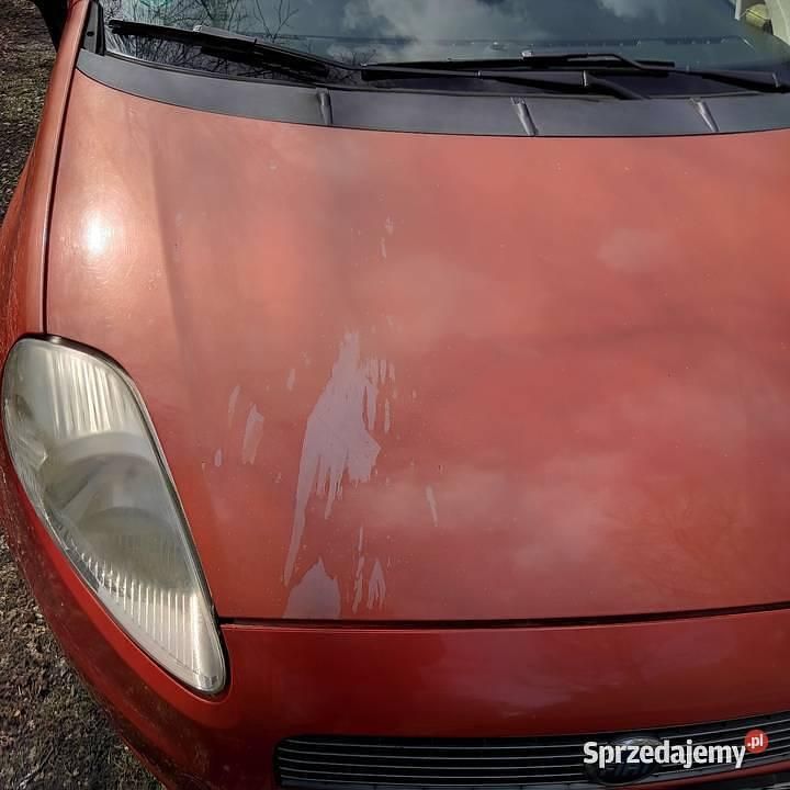 Pomarańczowy Używany 2006 Fiat Grande Punto Hatchback | 6000 zł (Uczciwa cena) - Obraz 1/4