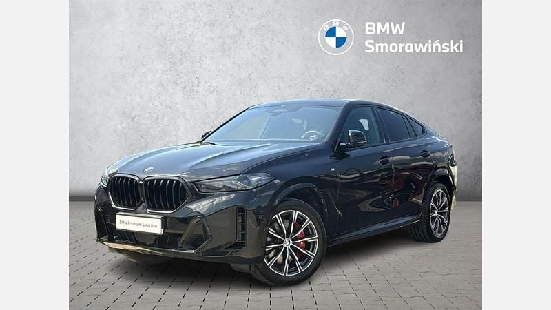 Czarny szafir metalizowany Używany 2024 BMW X6 Comfort Edition SUV | 424 900 zł - Obraz 1/3