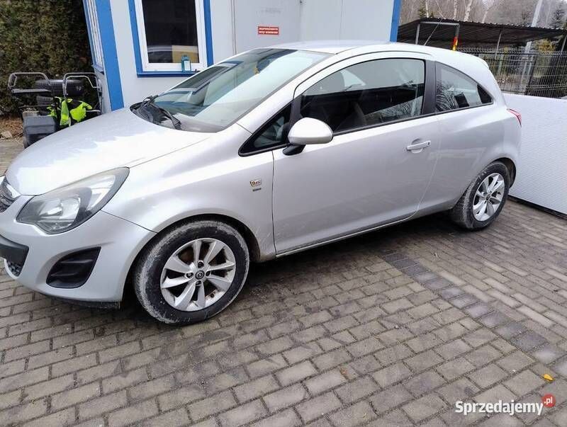 Srebrny Używany 2014 Opel Corsa Hatchback | 19 999 zł (Uczciwa cena) - Obraz 1/4